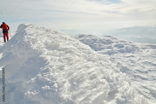 Mt Yotei ski touring ascent on sunny winter day Hokkaido Japan