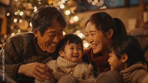 Medium shot of a joyful Asian family gathering in a snug, warm home,