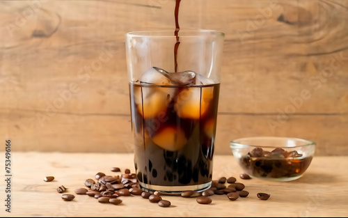 Cold drip arabica black coffee in glass with ice ball