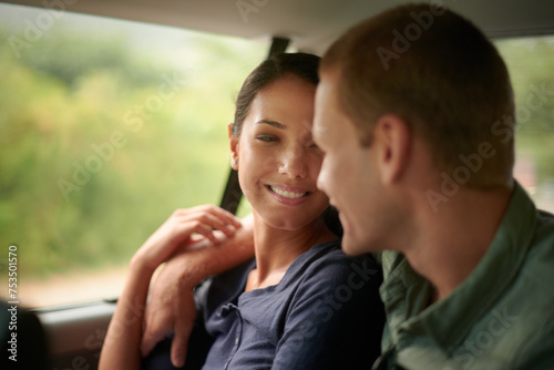 Love, hug and couple in a car for road trip, bonding or romantic, vacation or adventure outdoor. Travel, transport or people embrace in vehicle for holiday, bonding and countryside journey with care