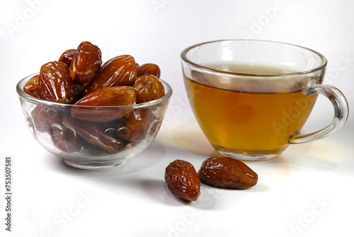 cup of tea and date fruits photo