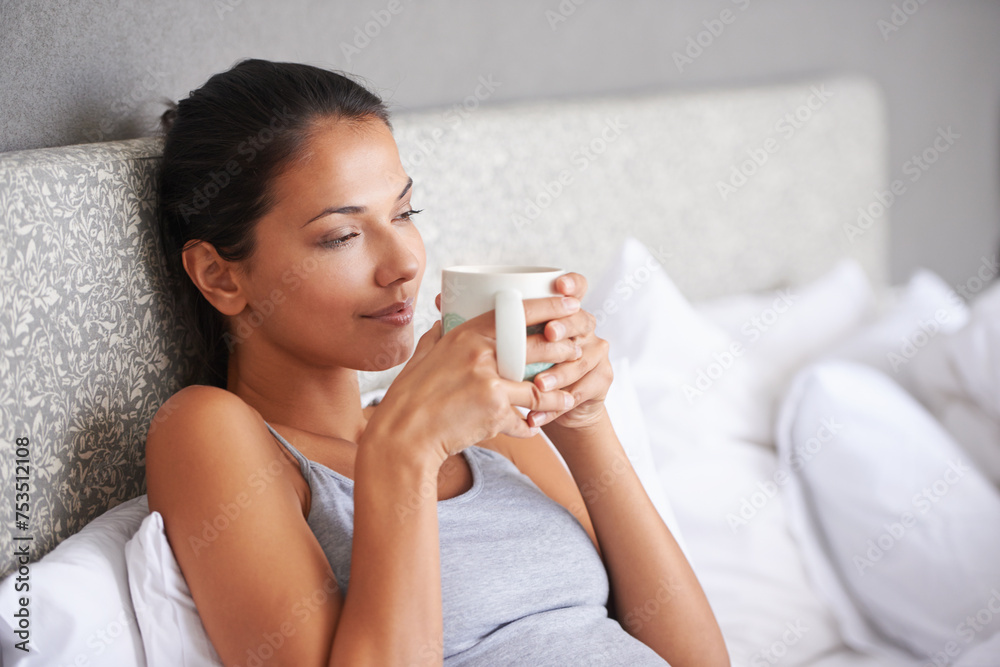 Woman, drinking coffee and bed thinking for morning caffeine on weekend or relaxing break, day off or leisure. Female person, beverage and linen in apartment with thoughts for Sunday, resting or calm Woman, drinking coffee and bed thinking for morning caffeine on weekend or relaxing break, day off or leisure. Female person, beverage and linen in apartment with thoughts for Sunday, resting or calm