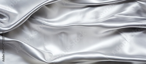 Glistening Silver Silk Fabric - Luxurious Texture Background in Metallic Shades