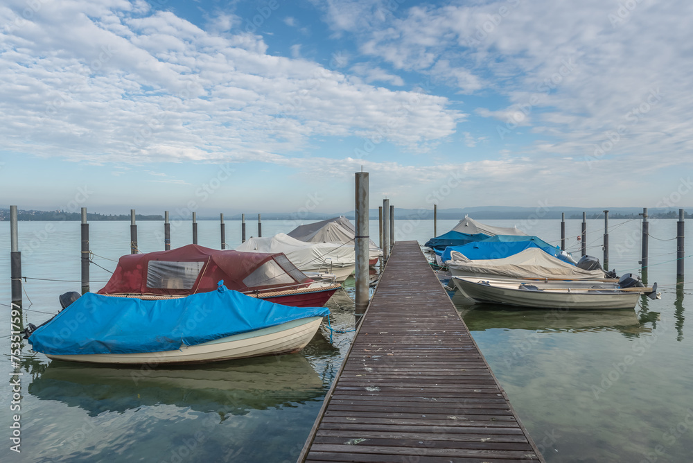 Boats moored at jetty on Lake Constance, Berlingen, Canton of Thurgau, Switzerland