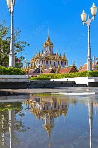 Pagoda in Ratchanatda temple or metal castle, One third of the world, in Thailand. photo