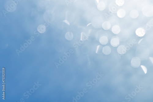 abstract bokeh effect. light blue background. blur and defocus for backdrop or graphic resources.