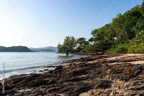 Tropical rocky beach on Naka Island