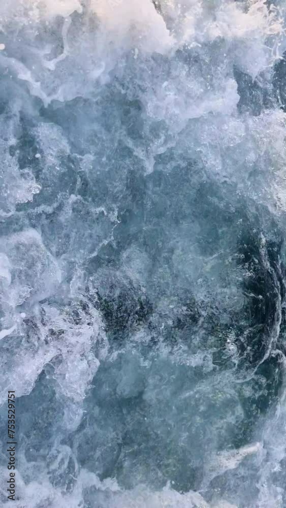 Water bubbling and splashing in whirlpool. Vertical video. Water bubbling and splashing in whirlpool. Vertical video.