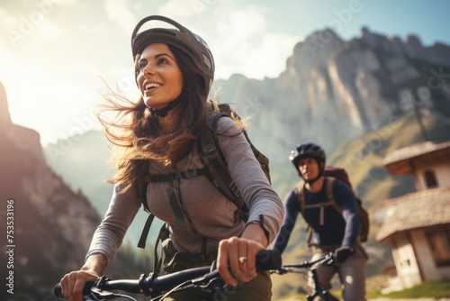 Cycling couple in mountains, adventure, scenic.