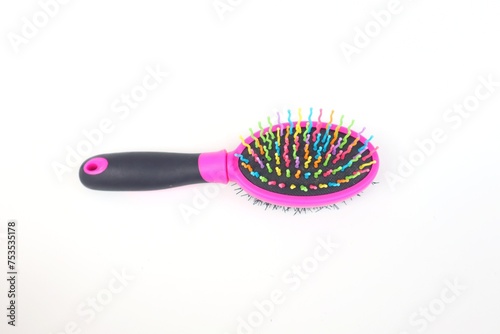 Colorful Round Nylon Paddle Brush hair comb  white background.