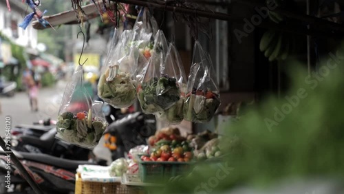 Vegetables in plastic bag in small grocery market, Bangkok, Thailand