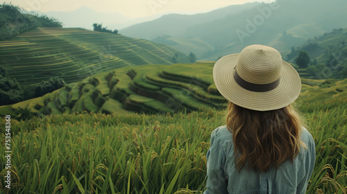 European girl among rice terraces and green plantations in Asia © brillianata