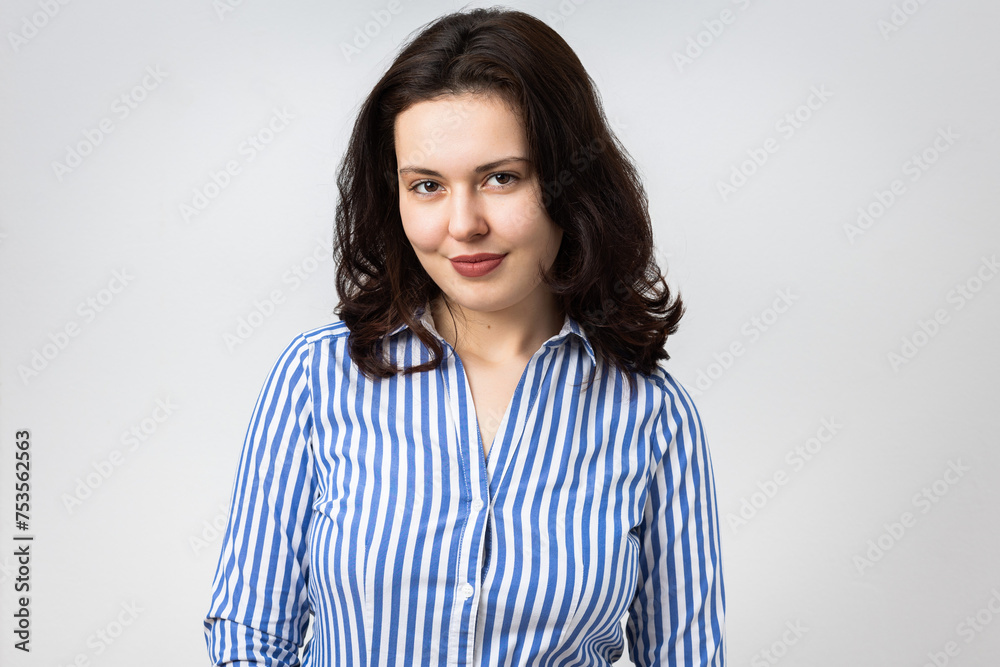 Young attractive woman smiling at the camera Young attractive woman smiling at the camera