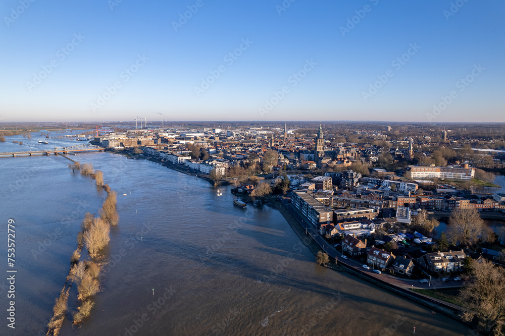 Aerial of river IJssel passing Dutch tower town Zutphen, The Netherlands