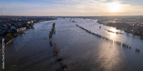 Panorama aerial showing extreme high water level of river IJssel in Zutphen  The Netherlands with inundated floodplains and waterway out of its normal flow riverbanks