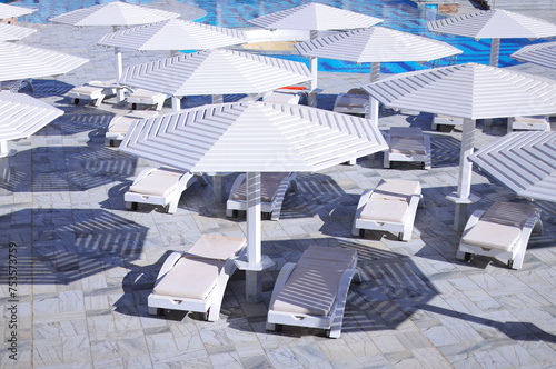 Sun umbrellas in the pool area.