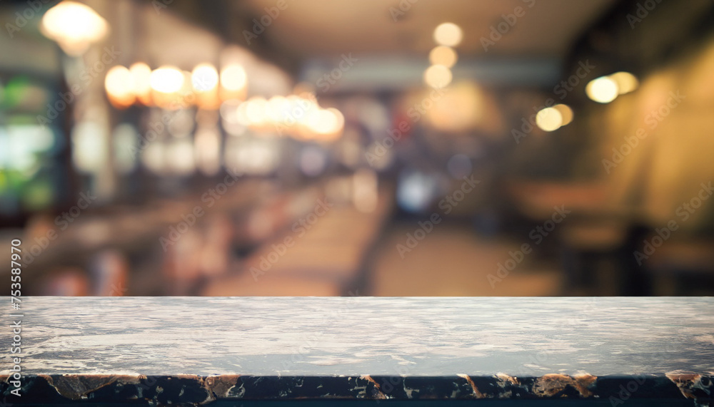 Stone table top and blurred restaurant interior background with vintage filter - can used for display or montage your products., mock up, template, food concept