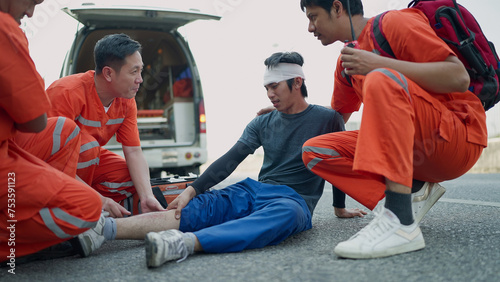 Tableau sur toile Professional team rescue helping crash victim after car accident on hightway road before being taken to the hospital