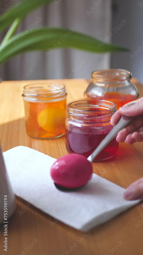 woman hands coloring easter eggs woman hands coloring easter eggs