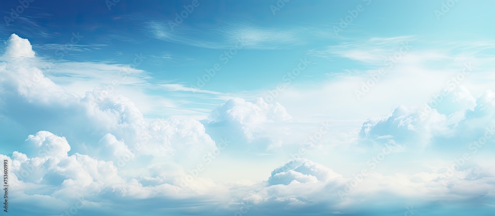 Serenity of Nature: Tranquil Blue Sky with Fluffy White Clouds Overhead Serenity of Nature: Tranquil Blue Sky with Fluffy White Clouds Overhead