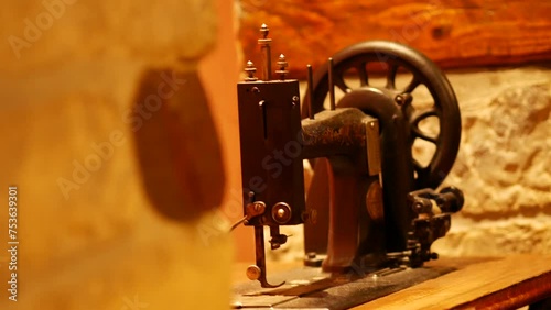 Vintage foot operated mechanical sewing machine from the late 19th century. Antique Seidel and Naumann Hand crank Transverse Shuttle Sewing machine. Istria, Croatia - November 25, 2023