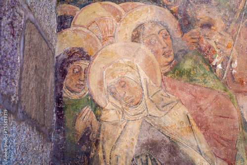 Painting on the wall of women praying