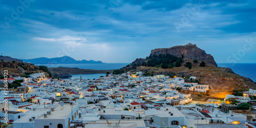 View over Lindos village towards the Acropolis at dawn, Rhodes Island, Dodecanese photo