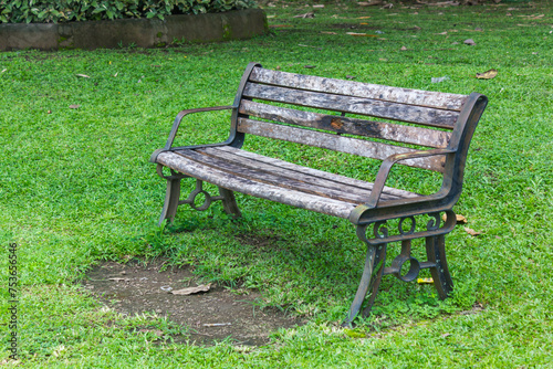 Lonely old vintage bench on the park