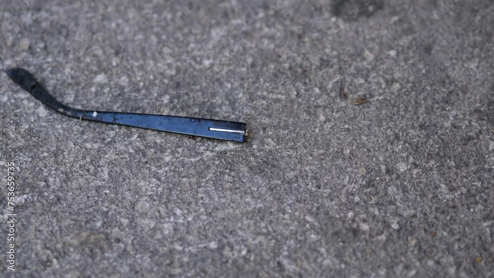 Frame from broken eye glasses lies on asphalt. Reading glasses ear plastic part was lost after accident. Eye glasses for older people. Optic repair concept. Rovinj, Croatia - February 13, 2023 Frame from broken eye glasses lies on asphalt. Reading glasses ear plastic part was lost after accident. Eye glasses for older people. Optic repair concept. Rovinj, Croatia - February 13, 2023
