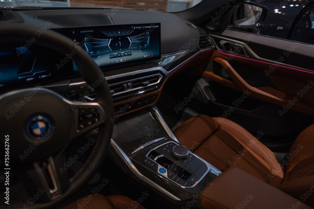 digital gauge cluster, steering wheel, center console BMW i4 electric