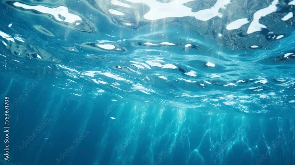 Underwater background with ripples and bubbles. Blue water surface.