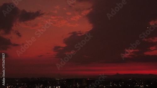 images of bogota at twilight with a beautiful red color of the sky #753678157