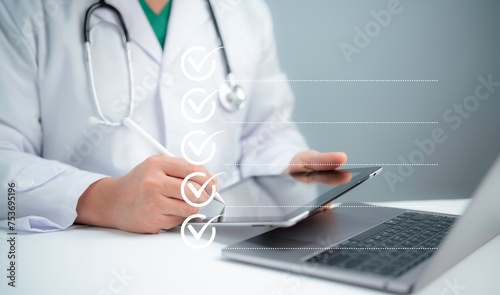 Check list concept.Medical worker with online checklist survey, filling out digital form checklist, take an assessment, questionnaire, evaluation, online survey, online exam