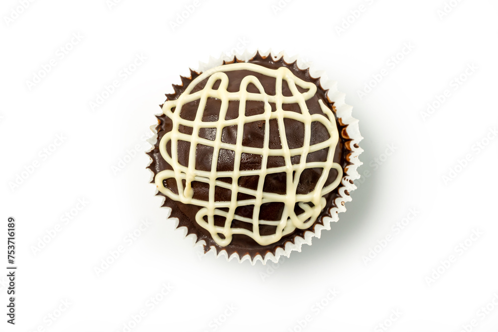 Chocolate muffin with white chocolate glaze isolated on white background. Top view. Chocolate muffin with white chocolate glaze isolated on white background. Top view.