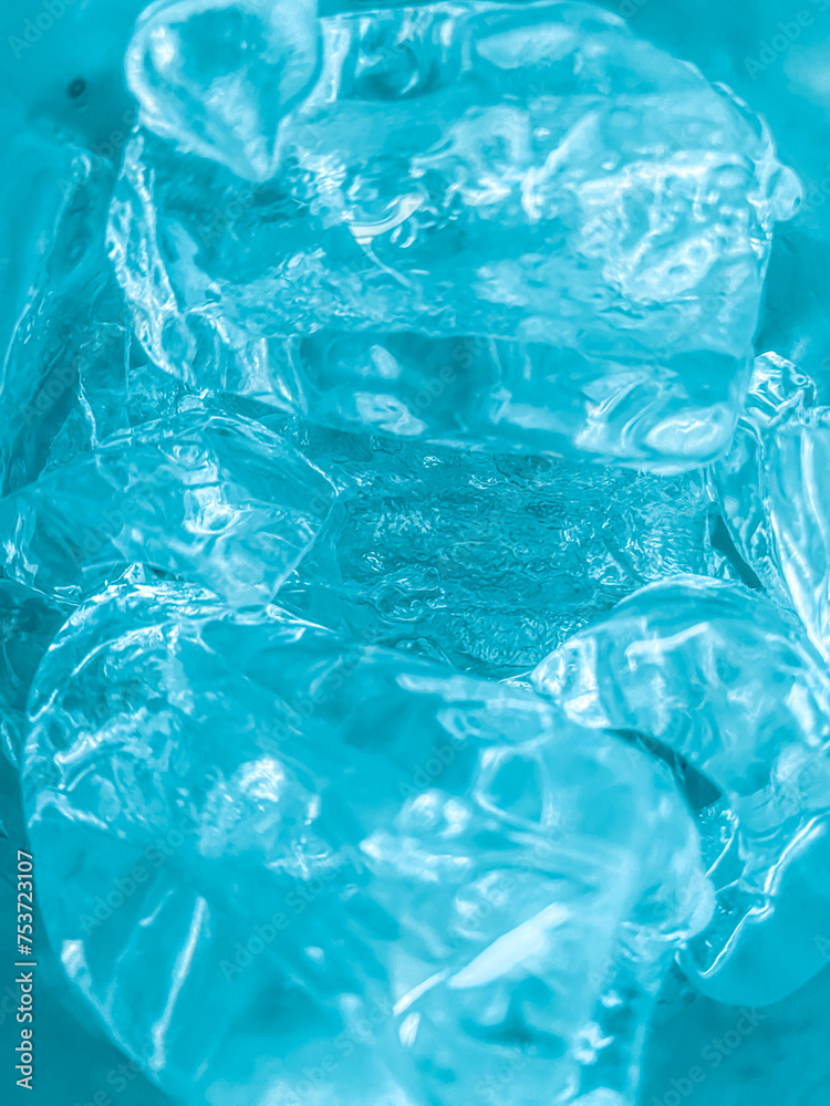 Fototapeta premium Ice cubes background, ice cube texture, ice wallpaper It makes me feel fresh and feel good. In the summer, ice and cold drinks will make us feel relaxed, Made for beverage or refreshment business.