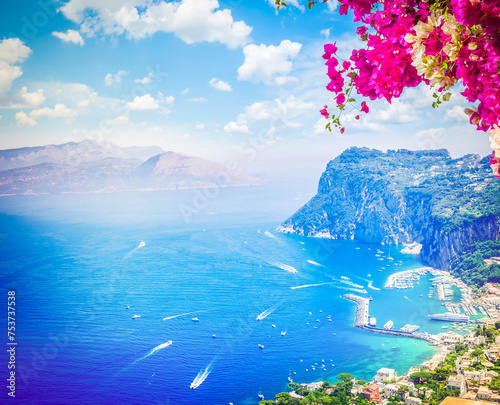 Marina Grande habour with cloudy sky with flowers, Capri island, Italy photo