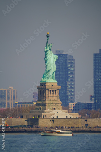 The Statue of Liberty - New york cityscape river side which location is lower manhattan. Architecture and building with tourist concept.