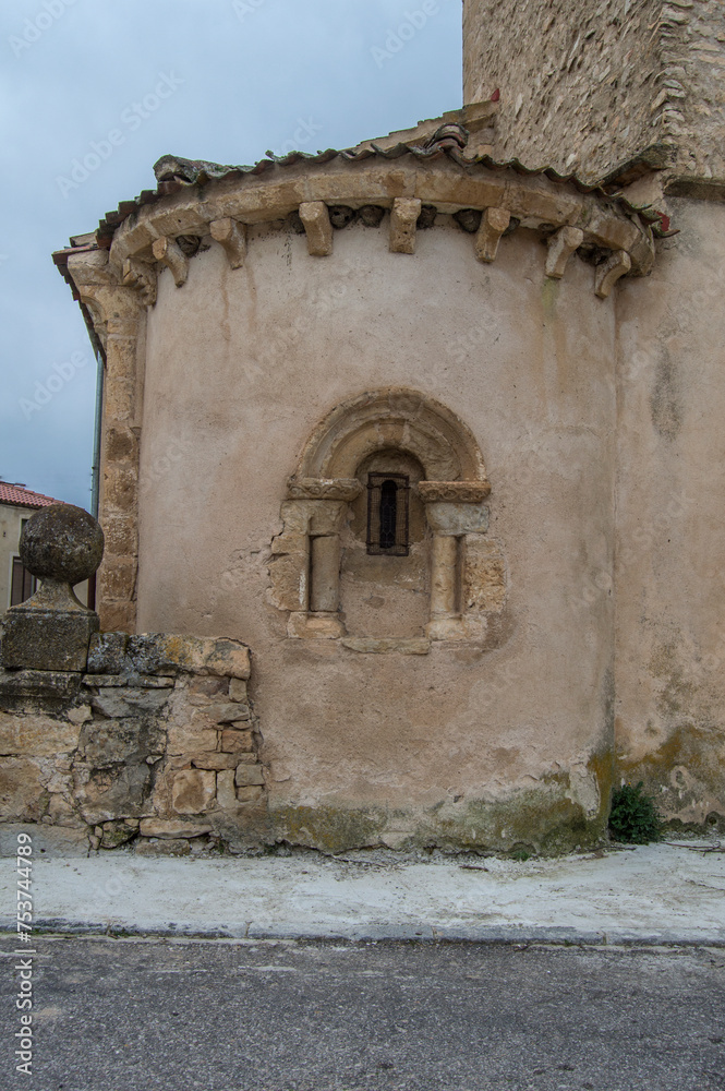 Church apse with Romanesque window with columns and semicircular arch