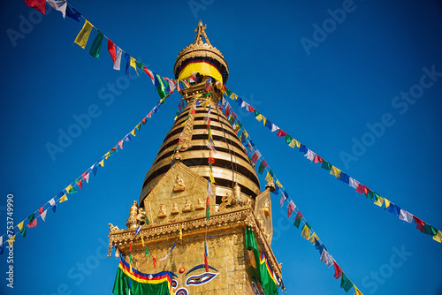 Fotografi Striking View of Swayambhunath Stupa with Vibrant Prayer Flags in Kathmandu, Nep