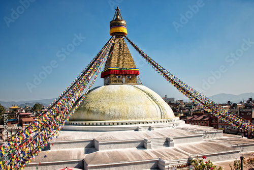 Boudhanath Stupa Under Clear Blue Skies, a Symbol of Peace and Faith in Kathmandu, Nepa