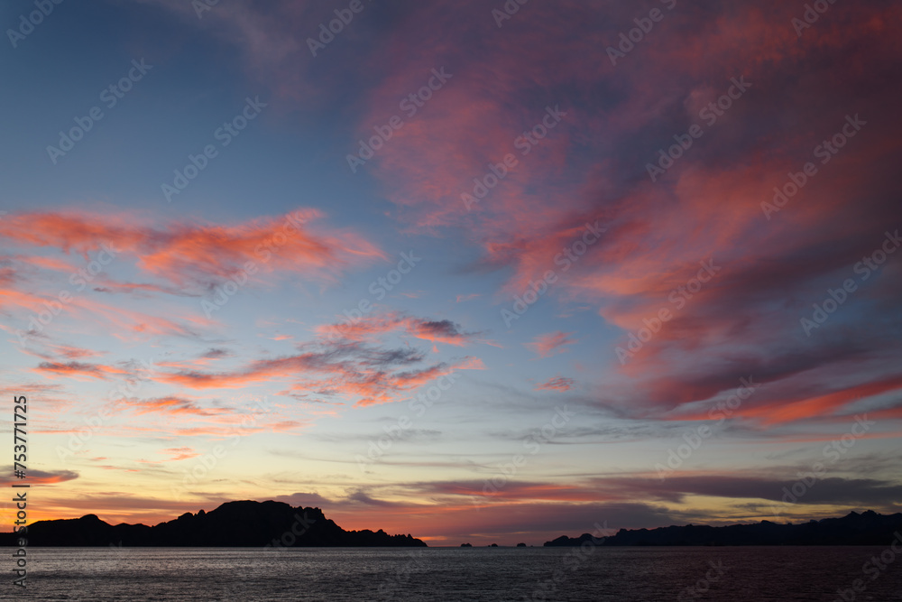 Sunrise Skies Over Sea & Islands