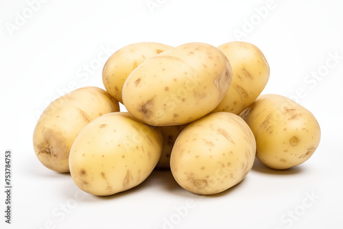 Freshly harvested  raw potatoes piled on a clean white background  ideal for food and agriculture themes