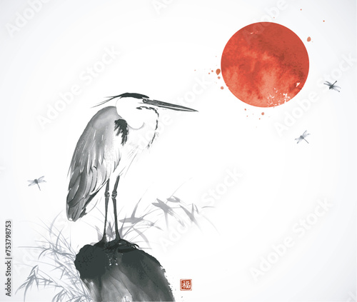 Ink wash painting with big red sun over a heron standing among reeds and dragonflies in flight. Traditional oriental ink painting sumi-e, u-sin, go-hua. Translation of hieroglyph - good luck