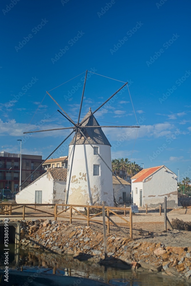 windmill in the village by the sea