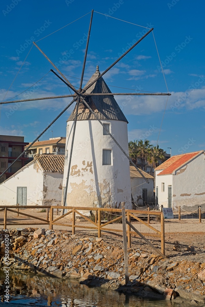 windmill in the village by the sea