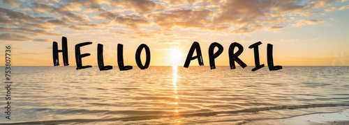 The text "HELLO APRIL" is written in large letters on the background of a sunset over a calm sea Generative AI
