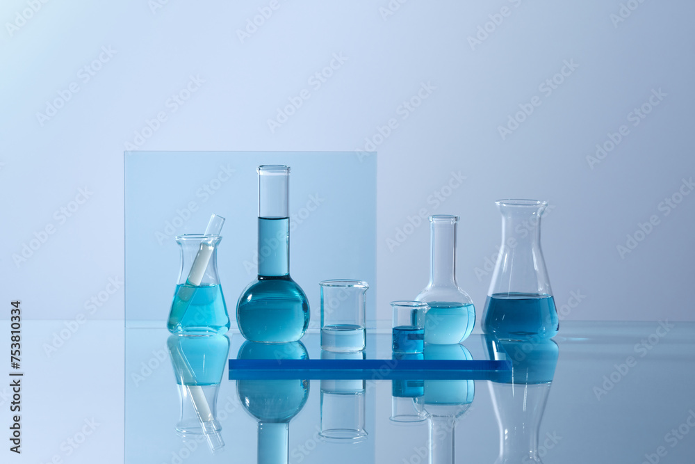 Laboratory glass equipment with blue water ingredients on Laboratory glass equipment with blue water ingredients on