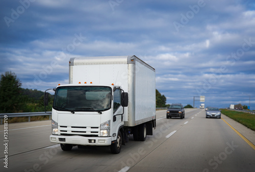 Cab-over transportation vehicle truck on highway delivering cargo