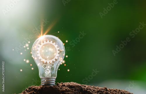 Light bulb with gear technology eco environmental green concept idea  energy for business nature to development, electricity into sustainable ecological in the future.