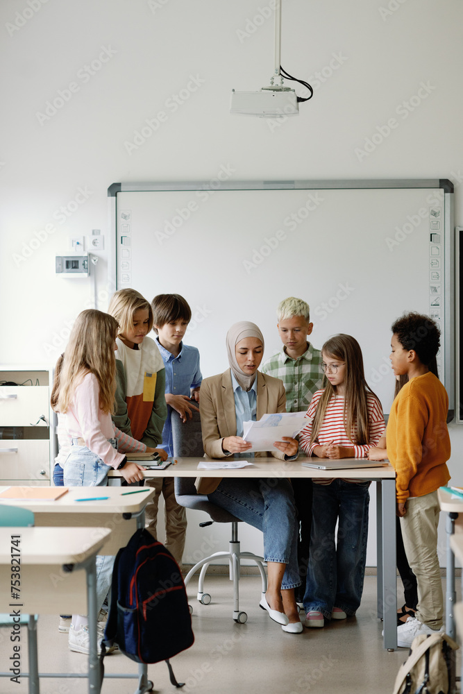 Art lesson teacher ponder student classmate feedback interact school Art lesson teacher ponder student classmate feedback interact school